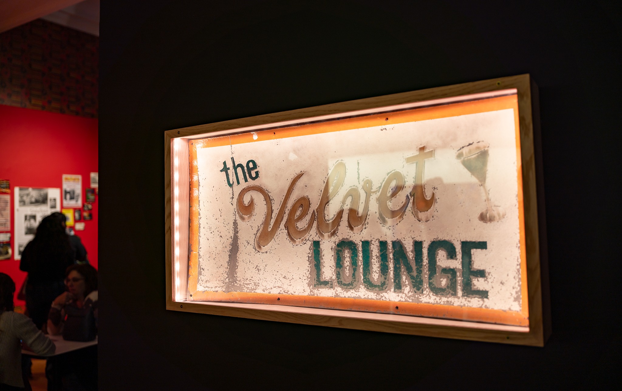 A dried flower rested upon wrinkled pieces of cloth paper.